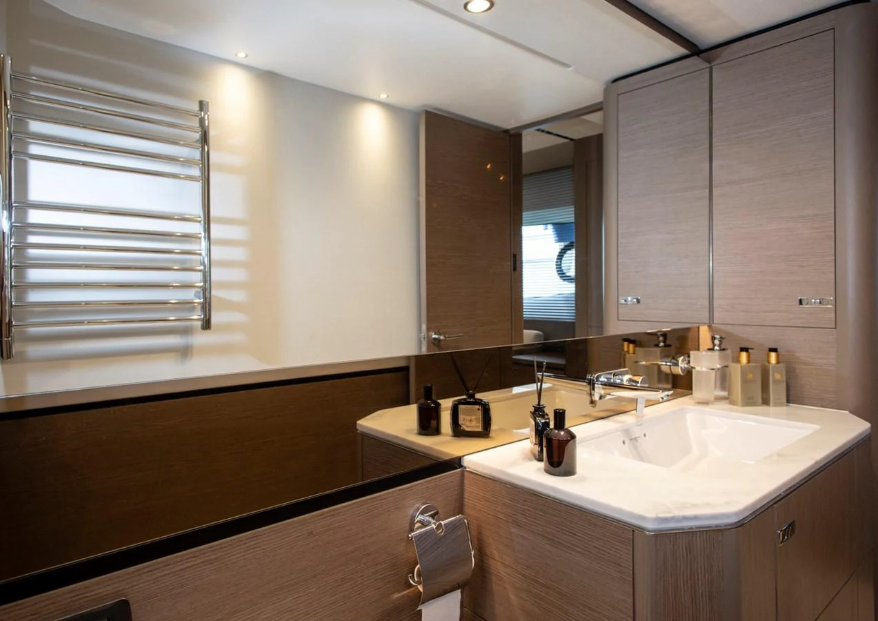 The yacht's bathroom features modern fixtures and a sleek design. aboard BK ONE Yacht for Sale