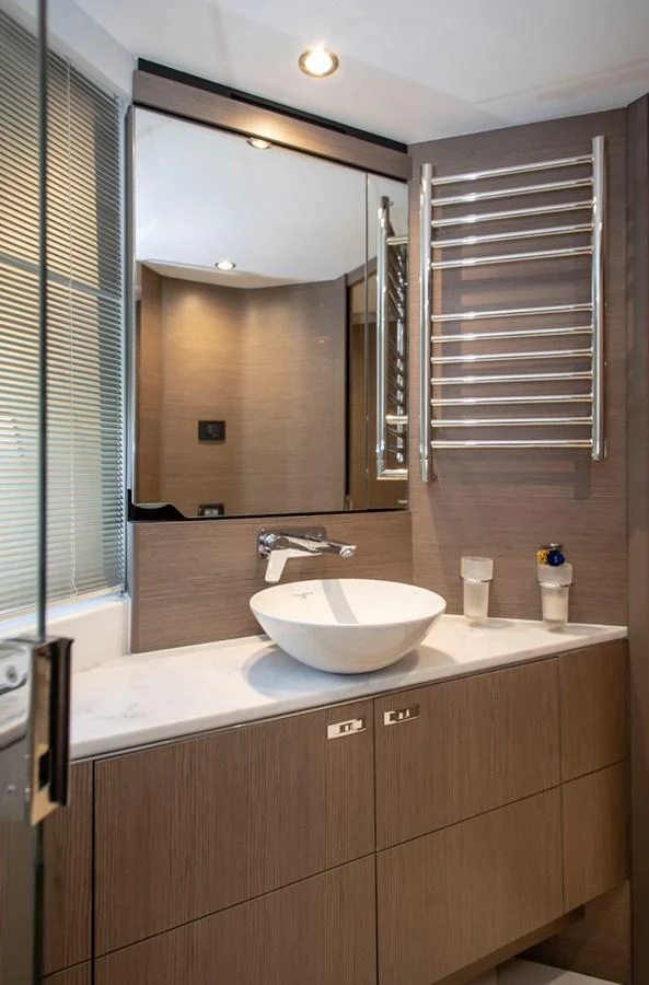 A modern yacht bathroom with sleek fixtures and a stylish design. aboard BK ONE Yacht for Sale