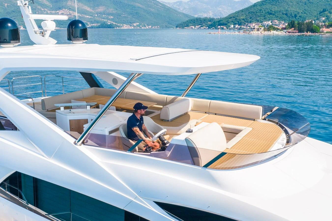 The yacht's flybridge offers a spacious and luxurious area for navigation and relaxation, with stunning views of the surrounding waters. aboard SUNSEEKER 76Y Yacht for Sale