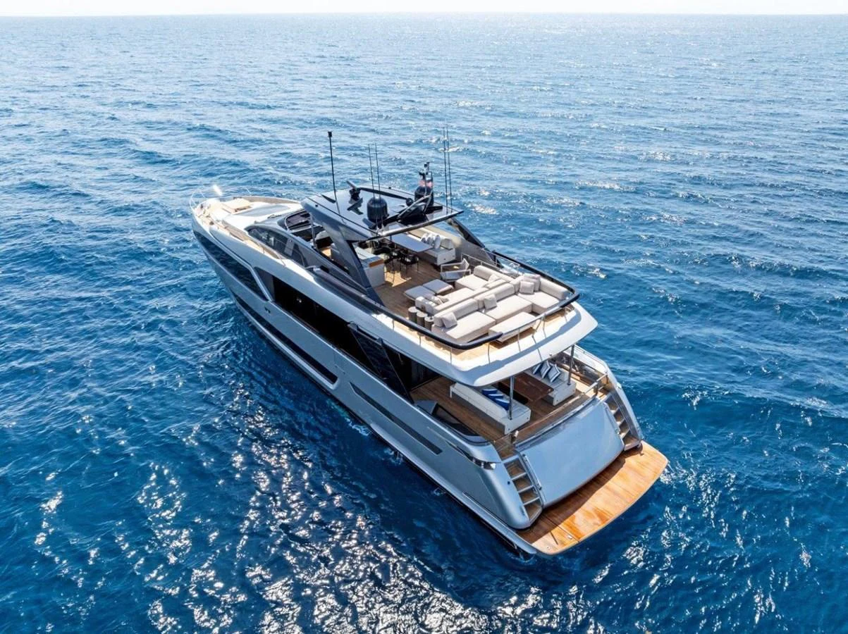A sleek and modern yacht cruising on the open sea with a spacious aft deck for relaxation. aboard MSEA Yacht for Sale