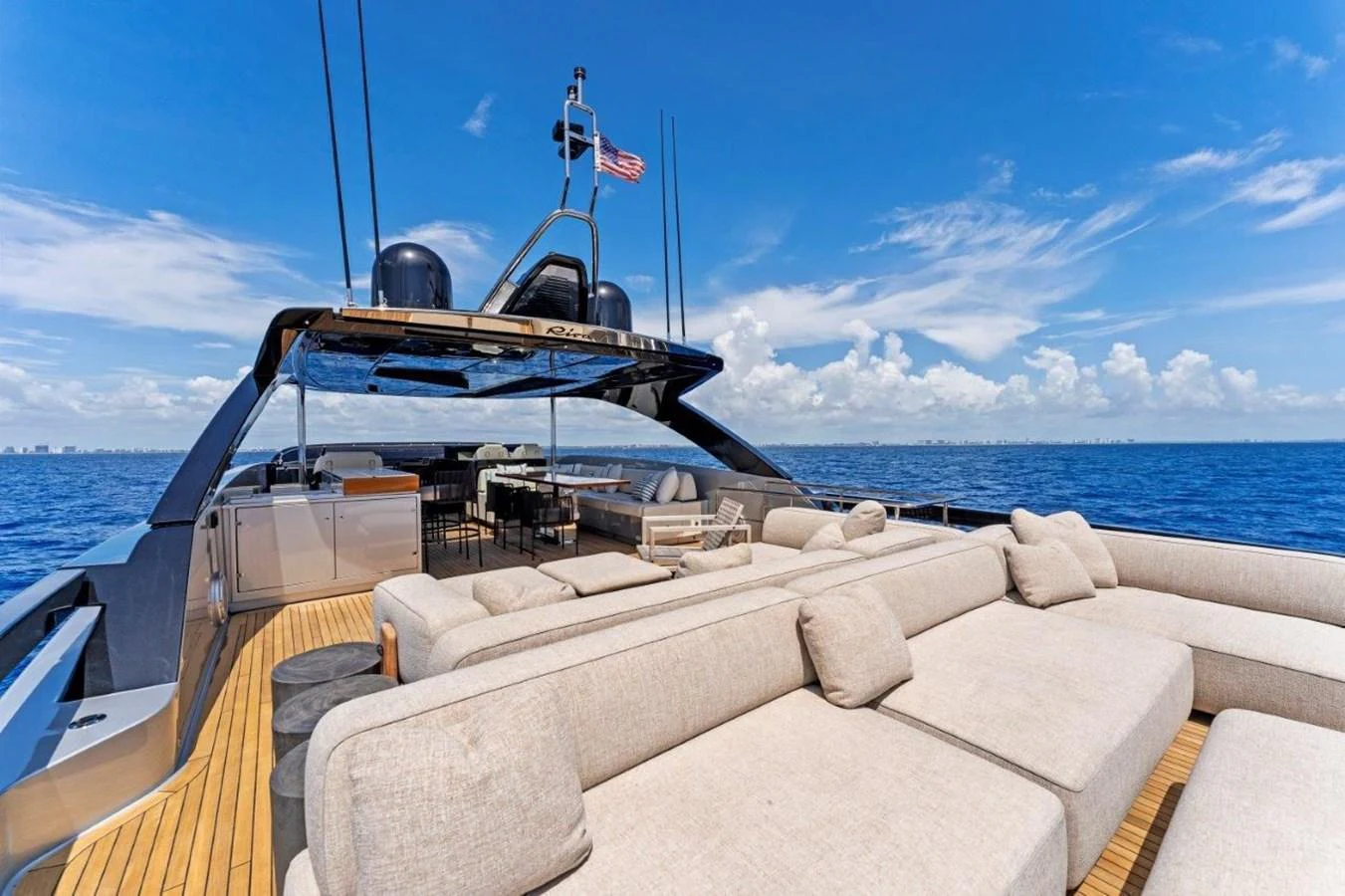 The yacht's sundeck offers luxurious lounging areas with panoramic ocean views. aboard MSEA Yacht for Sale