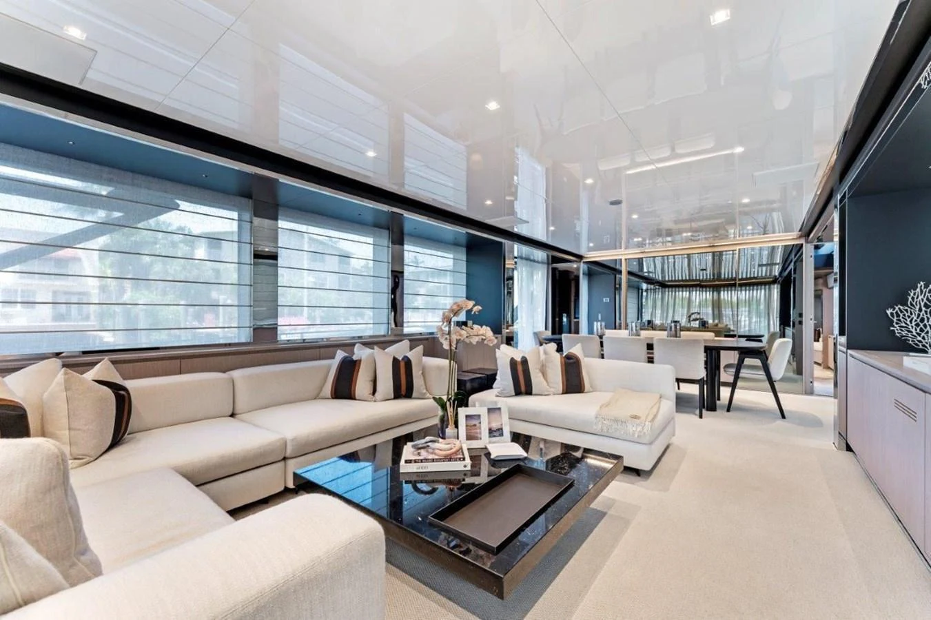 The spacious salon features luxurious seating and modern decor, perfect for relaxation and entertainment. aboard MSEA Yacht for Sale