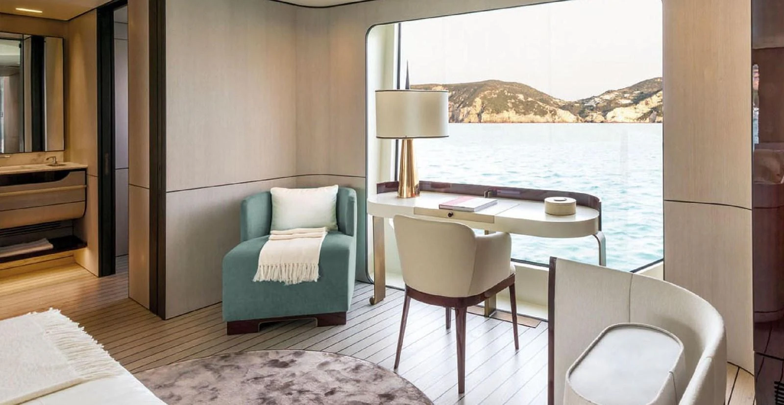 A luxurious stateroom with a large window offering a stunning sea view. aboard PANTERA Yacht for Sale