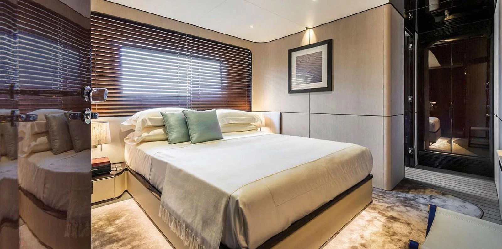 The master stateroom features a luxurious bed with elegant decor and ample natural light. aboard PANTERA Yacht for Sale