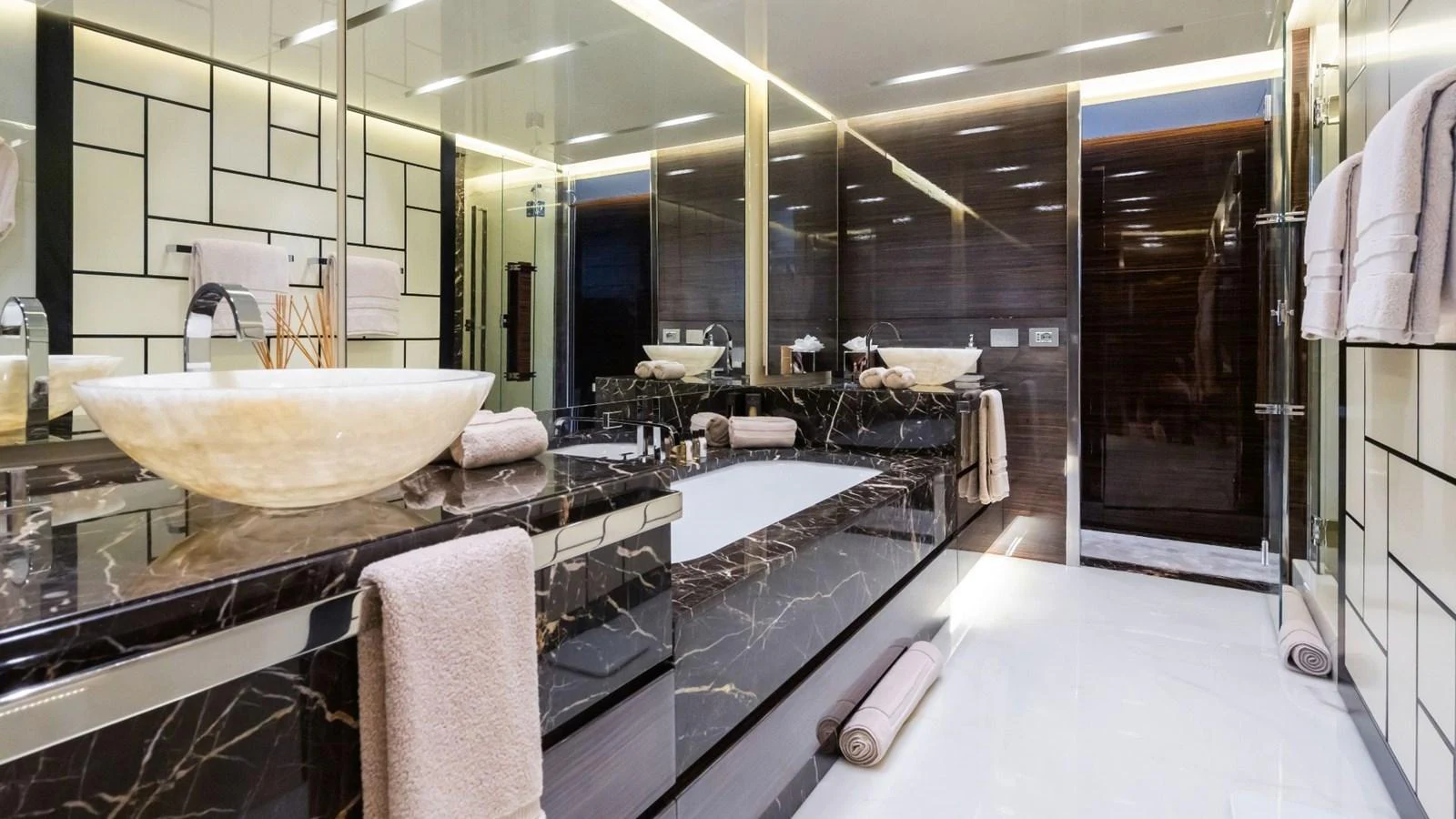 The yacht's bathroom features luxurious marble countertops and modern fixtures, creating an elegant and serene atmosphere. aboard BLUE MOON Yacht for Sale