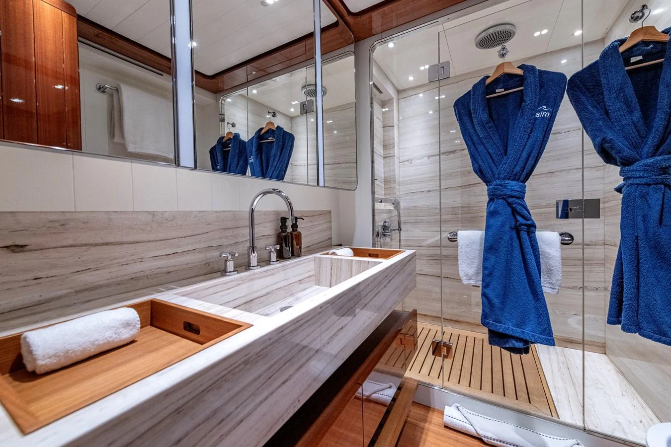 The yacht's bathroom features a luxurious design with elegant fixtures and plush amenities. aboard CALM Yacht for Sale