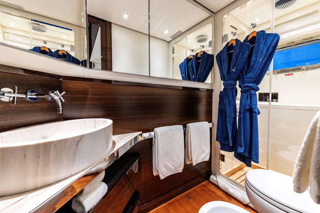 The yacht's bathroom features modern fixtures and luxurious amenities. aboard CALM Yacht for Sale