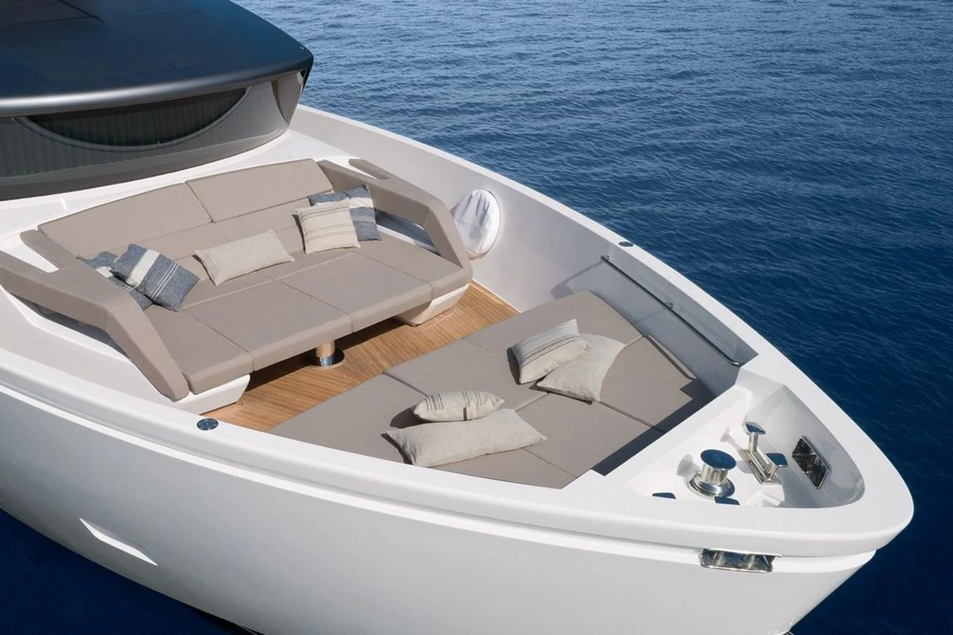 The yacht's bow features a spacious sunbathing area with comfortable seating and cushions. aboard SANLORENZO SX 76 KYOMU Yacht for Sale