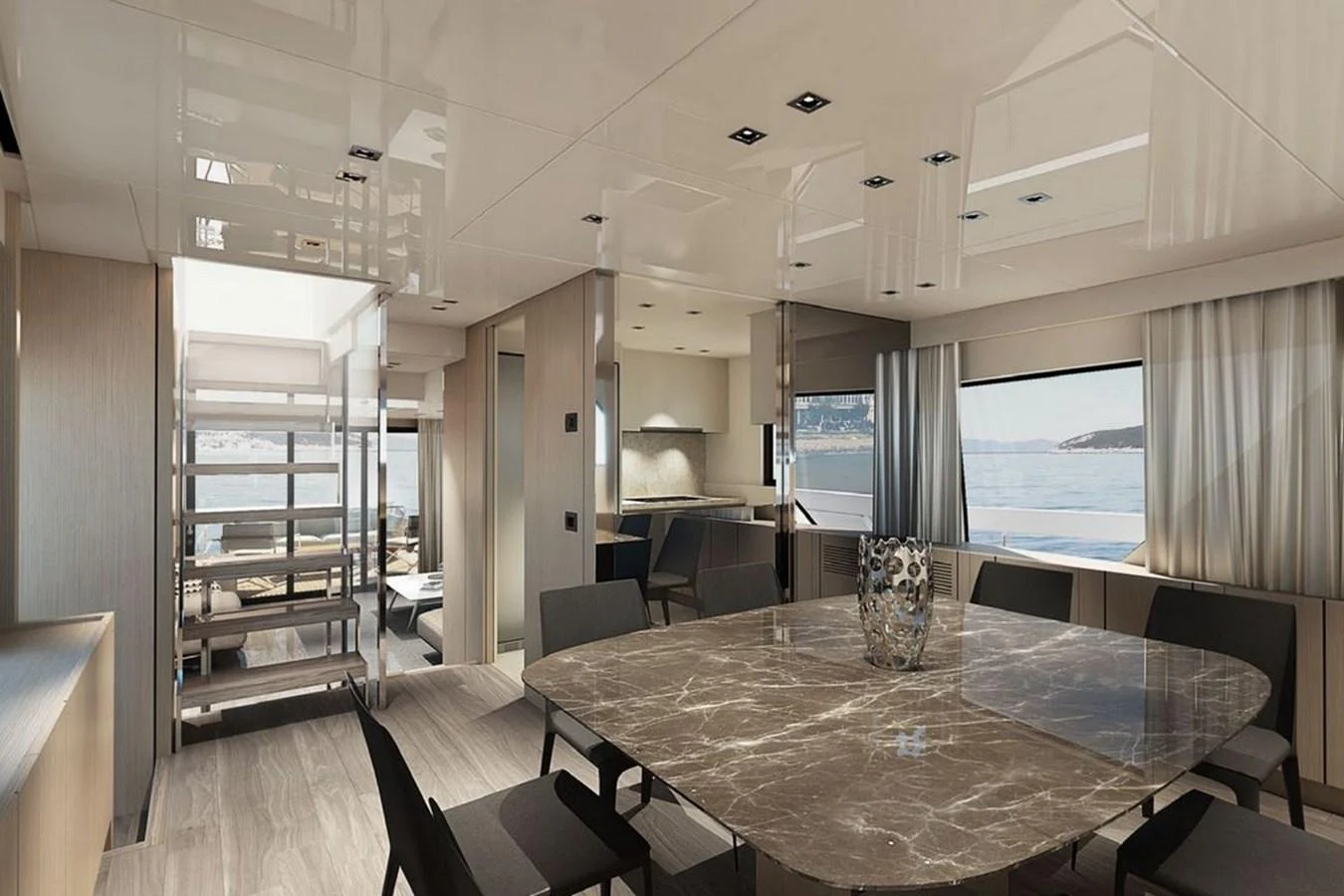 The yacht's dining area features a luxurious marble table with comfortable seating and a view of the sea. aboard SANLORENZO SX 76 KYOMU Yacht for Sale