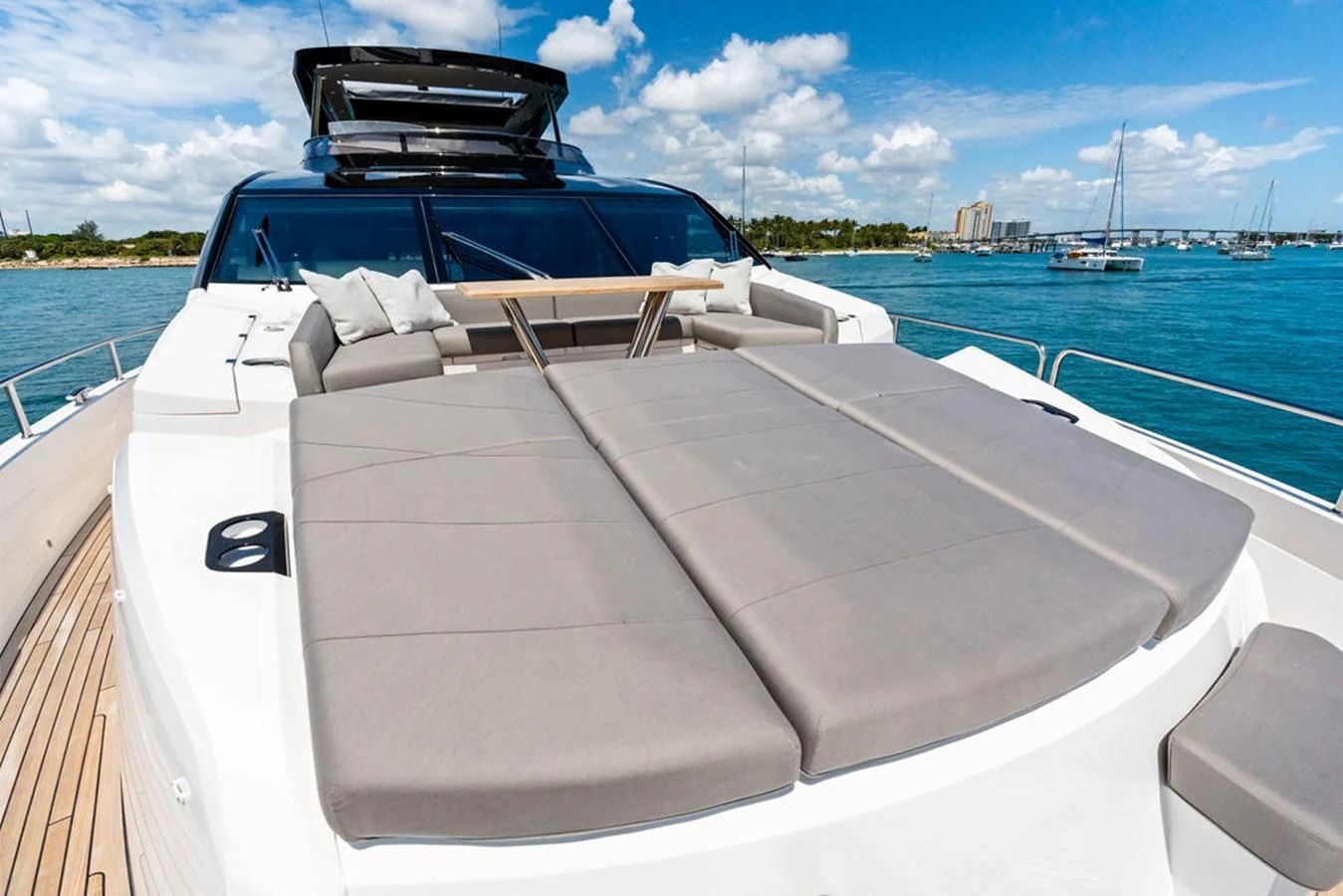 The yacht features a spacious sundeck with comfortable sunbeds and a dining area, perfect for relaxation and enjoying the views. aboard DOLCE FAR NIENTE Yacht for Sale