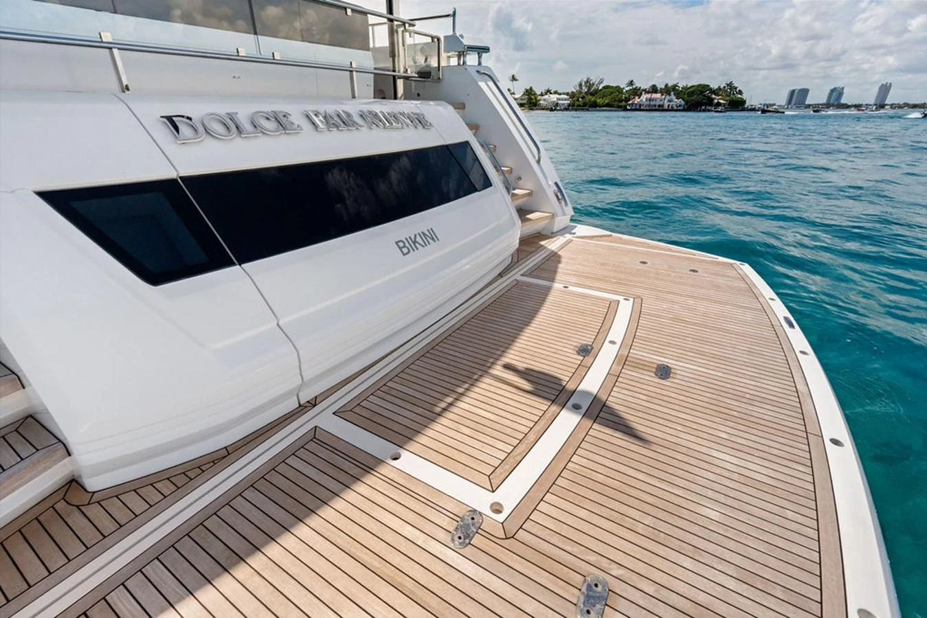 The yacht's aft deck features a spacious teak platform with access to the water. aboard DOLCE FAR NIENTE Yacht for Sale