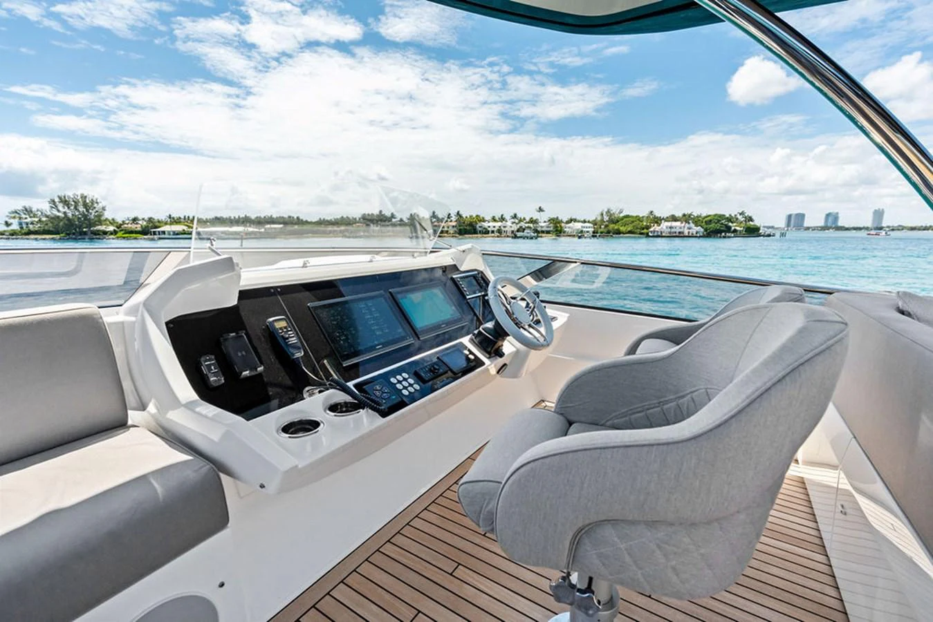 The helm station offers a sleek and modern design with advanced navigation equipment and a comfortable captain's chair. aboard DOLCE FAR NIENTE Yacht for Sale