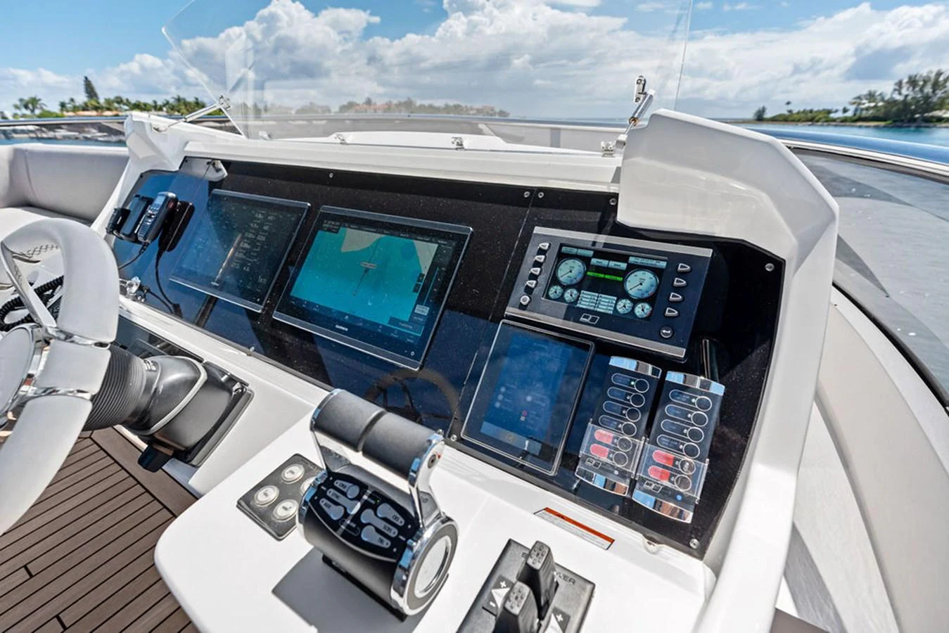 The helm station features advanced navigation and control systems with a sleek, modern design. aboard DOLCE FAR NIENTE Yacht for Sale