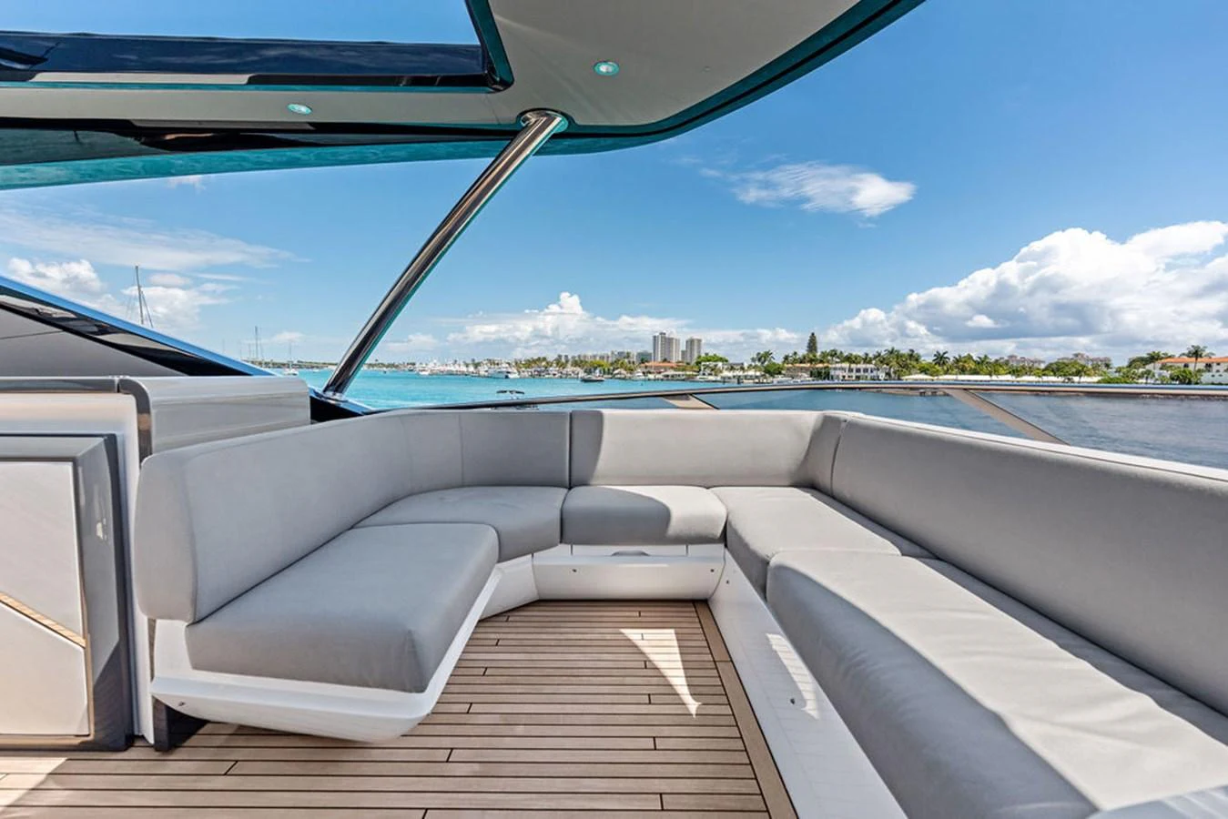 The aft deck features a spacious seating area with a stunning view of the water. aboard DOLCE FAR NIENTE Yacht for Sale