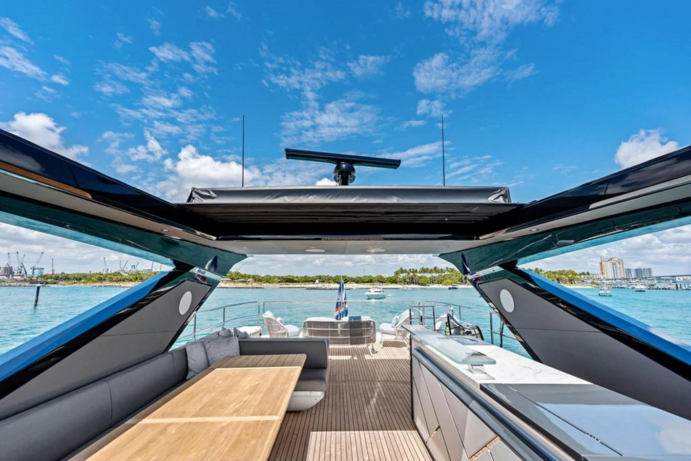 The flybridge offers a spacious and open area with comfortable seating and a stunning view of the water. aboard DOLCE FAR NIENTE Yacht for Sale