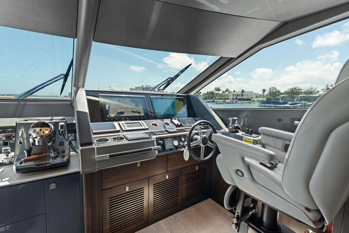 The helm station offers a sophisticated and well-equipped control area with panoramic views. aboard DOLCE FAR NIENTE Yacht for Sale
