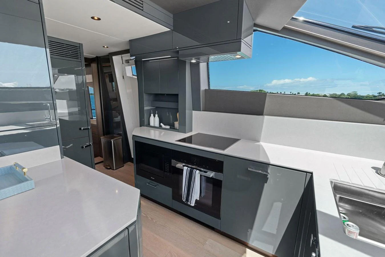 The modern galley features sleek cabinetry, ample counter space, and state-of-the-art appliances. aboard DOLCE FAR NIENTE Yacht for Sale