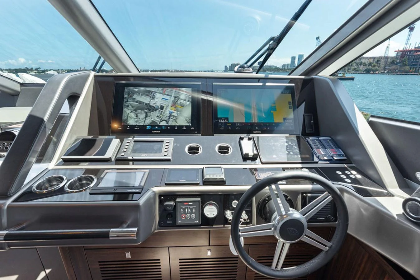 The helm station features advanced navigation equipment and a sleek, modern design. aboard DOLCE FAR NIENTE Yacht for Sale