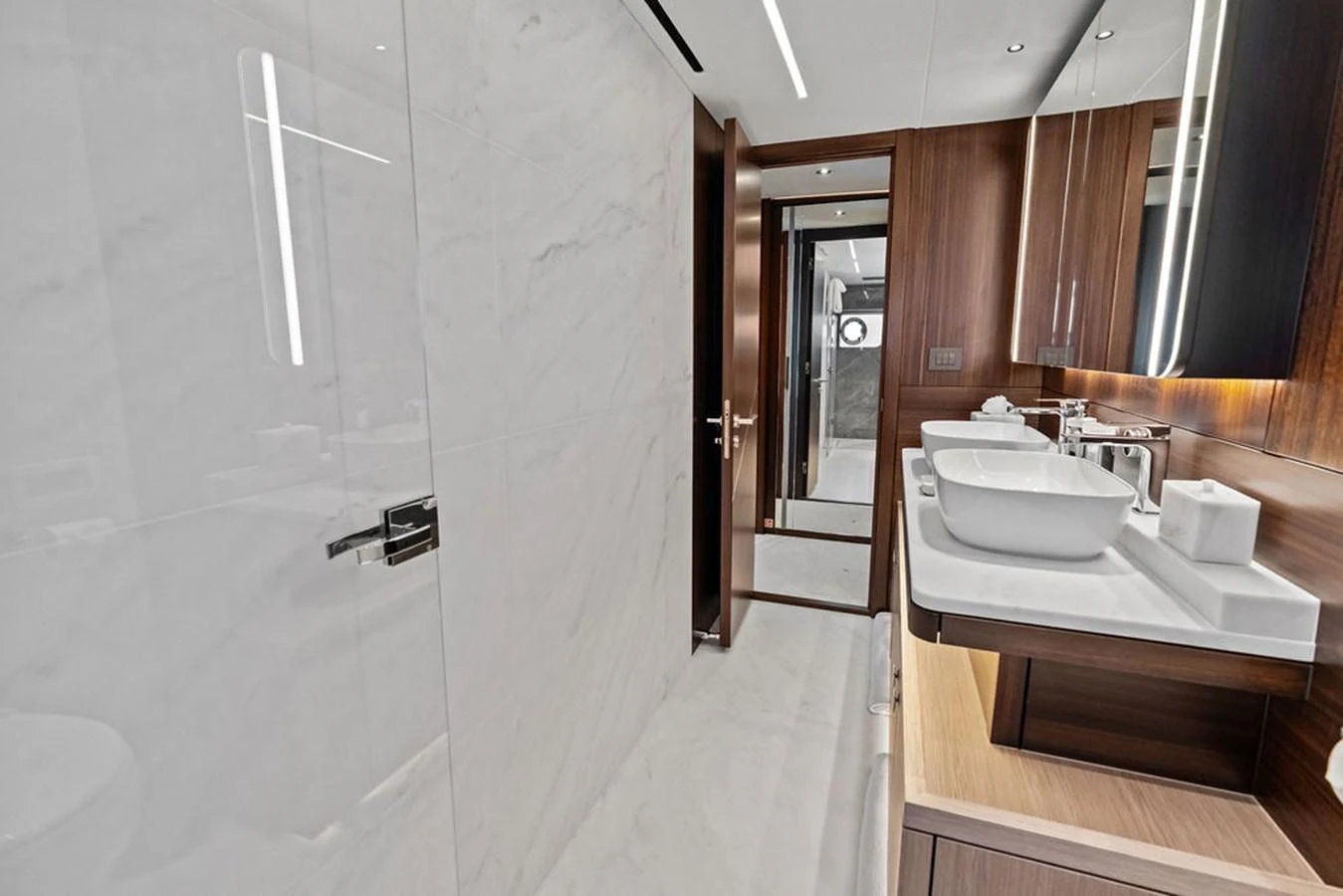 The yacht's bathroom features modern fixtures and elegant marble surfaces. aboard DOLCE FAR NIENTE Yacht for Sale