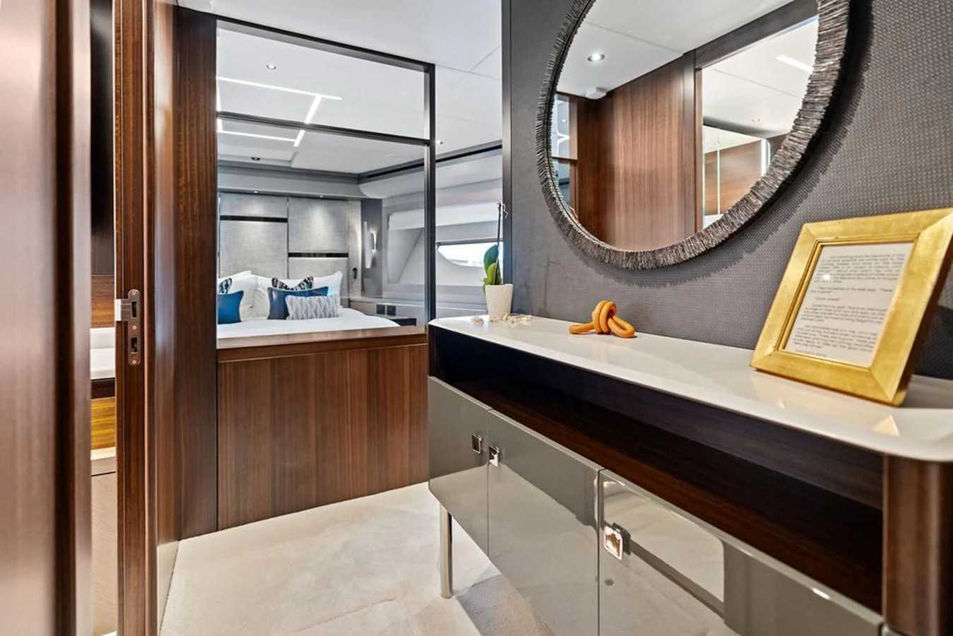 The image showcases a luxurious stateroom with elegant furnishings and modern decor. aboard DOLCE FAR NIENTE Yacht for Sale