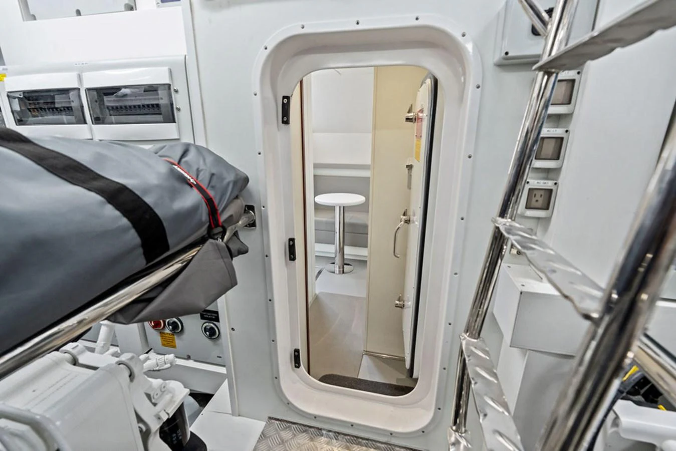This image showcases a functional interior space with a focus on utility and access. aboard DOLCE FAR NIENTE Yacht for Sale