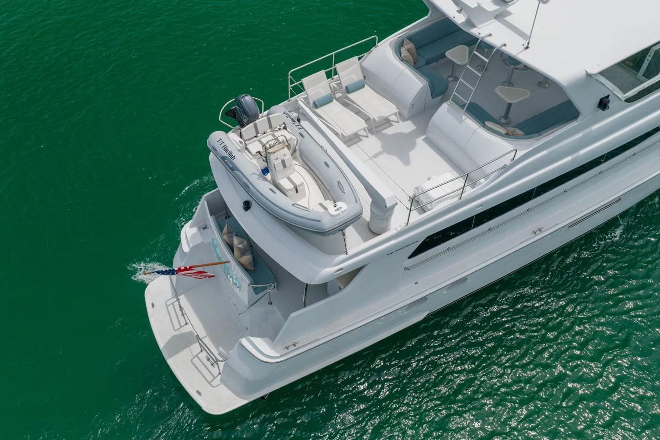This yacht's aft deck offers a spacious and inviting area for relaxation and enjoyment on the water. aboard HAVILAH Yacht for Sale