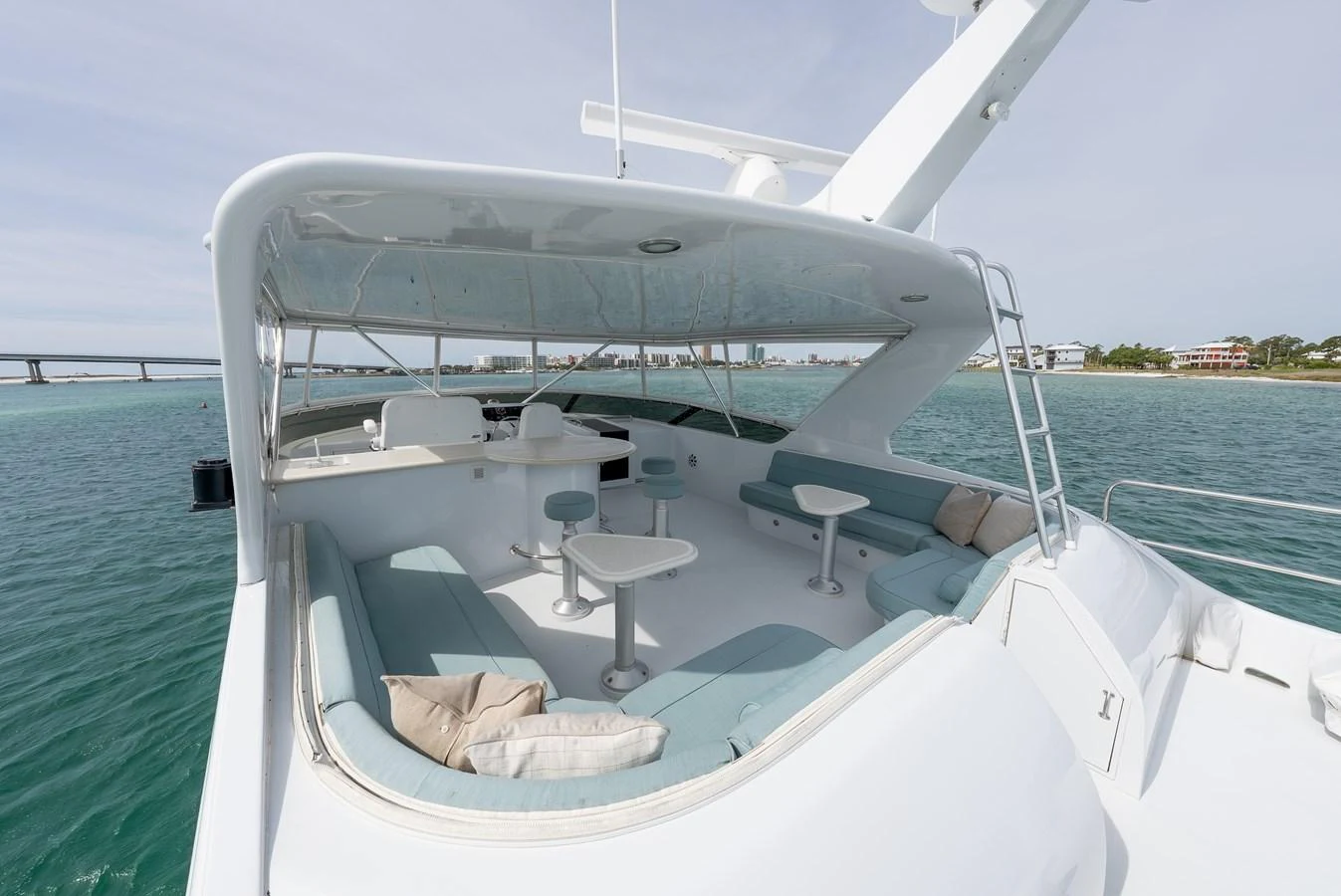 The flybridge offers a spacious and comfortable seating area with panoramic views of the surrounding waters. aboard HAVILAH Yacht for Sale