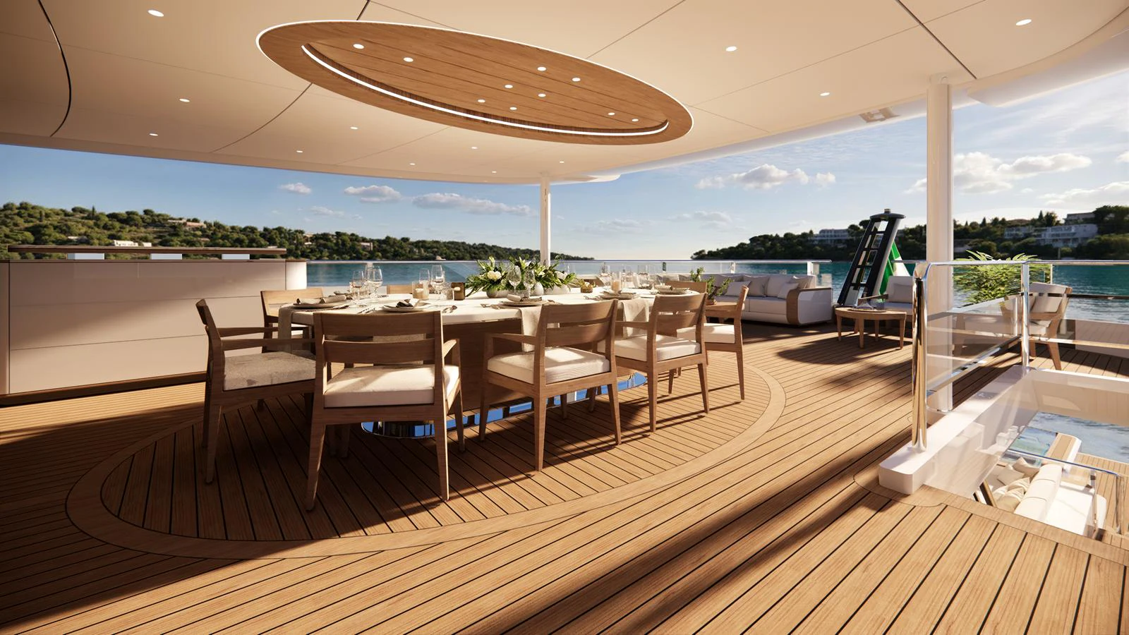 The aft deck features an elegant dining area with a stunning view of the surrounding waters. aboard NUVOLARI LENARD 52 PLUS Yacht for Sale