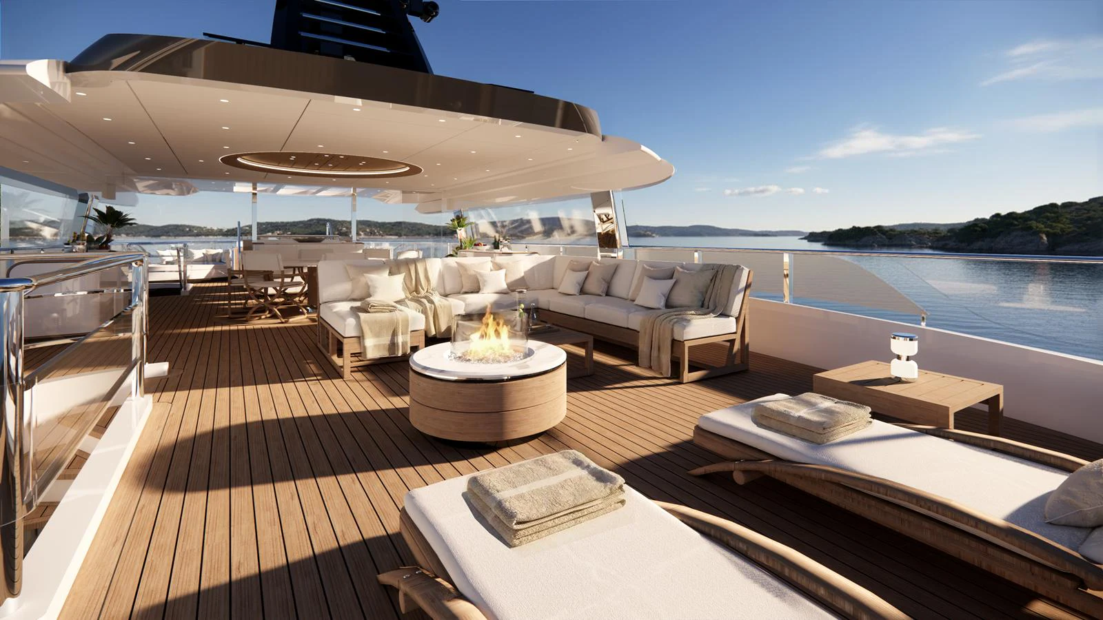 The sundeck features luxurious lounging areas with a central fire pit, offering stunning views of the surrounding waters. aboard NUVOLARI LENARD 52 PLUS Yacht for Sale