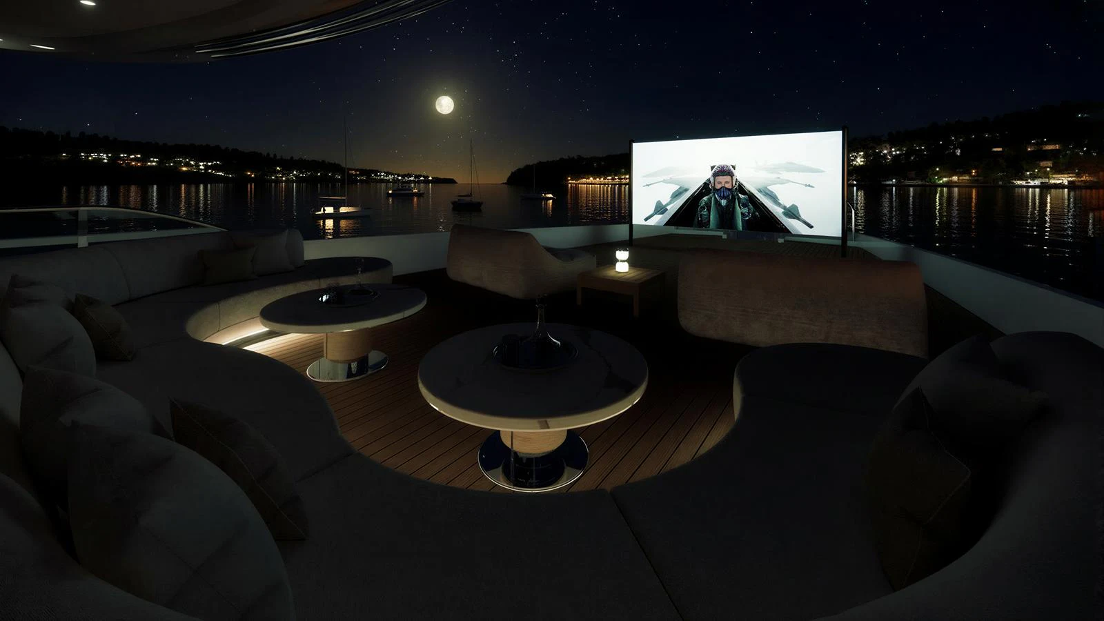 An elegant outdoor lounge area on the yacht features a large screen for nighttime entertainment under the stars. aboard NUVOLARI LENARD 52 PLUS Yacht for Sale