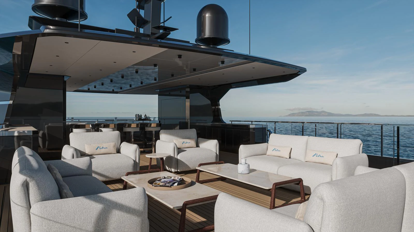 The flybridge offers a spacious and luxurious seating area with panoramic ocean views. aboard PETRA Yacht for Sale