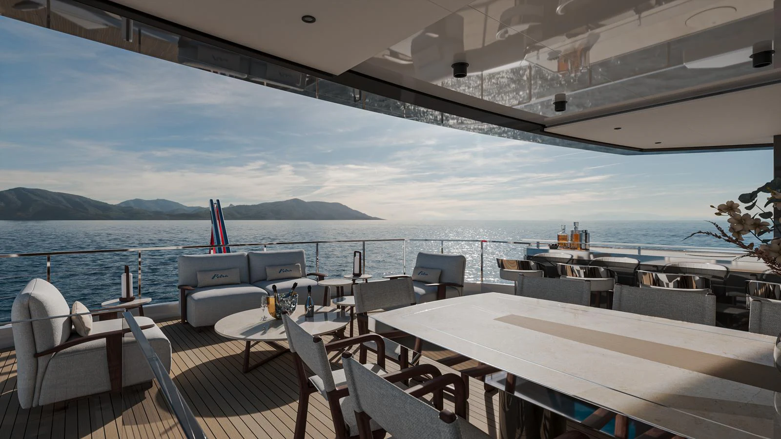 The aft deck offers a spacious and luxurious outdoor dining and lounging area with stunning ocean views. aboard PETRA Yacht for Sale