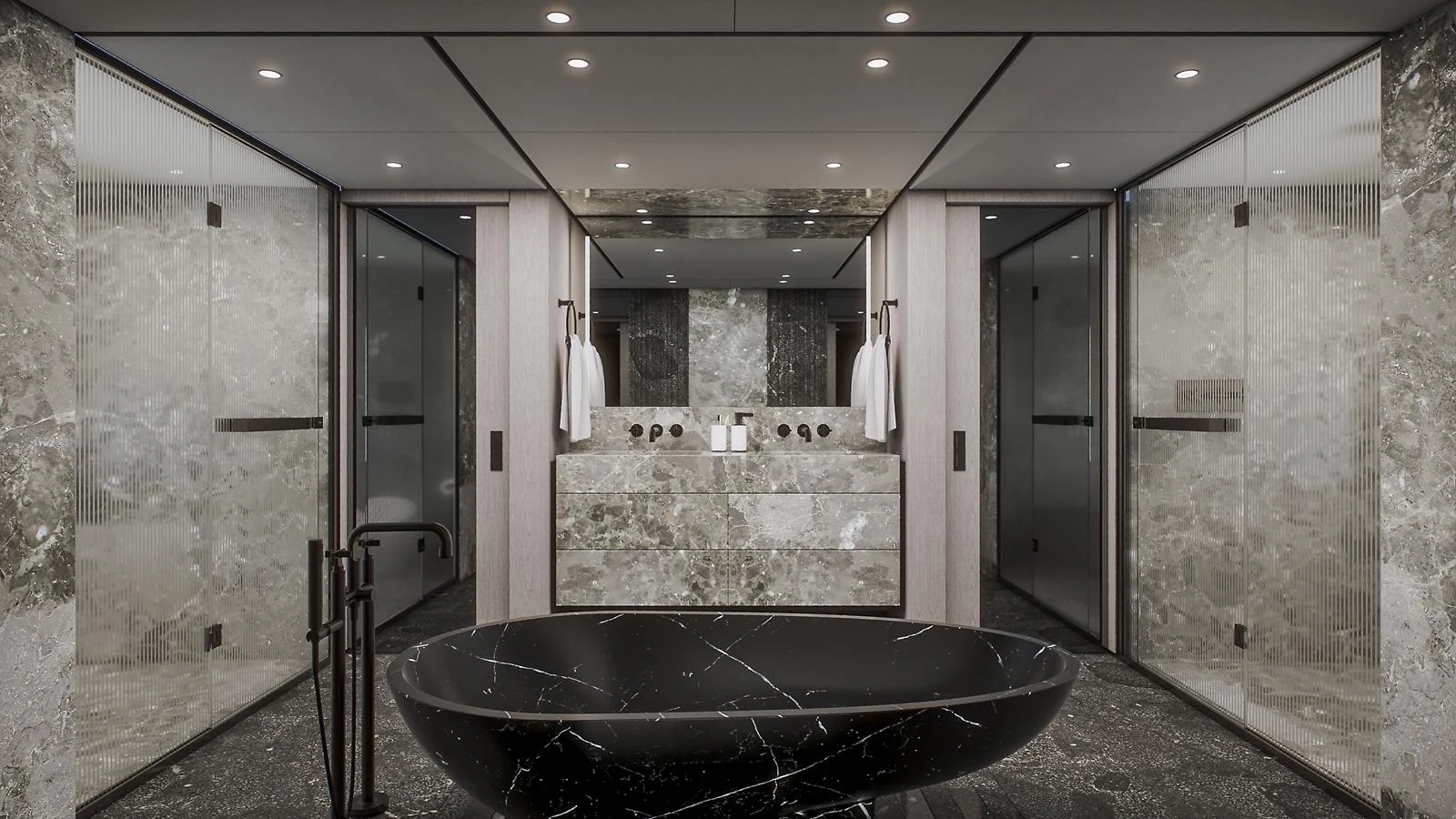 The yacht's bathroom features a luxurious black marble bathtub and elegant stone finishes. aboard PETRA Yacht for Sale