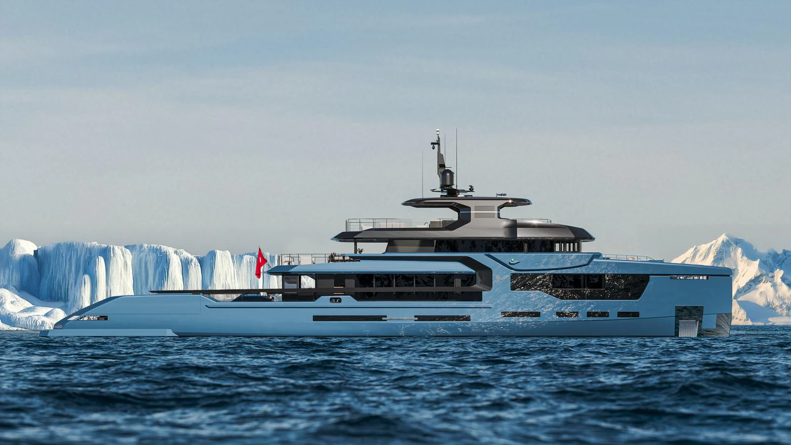 A sleek and modern yacht cruises through icy waters with a stunning backdrop of icebergs and snow-capped mountains. aboard PETRA Yacht for Sale