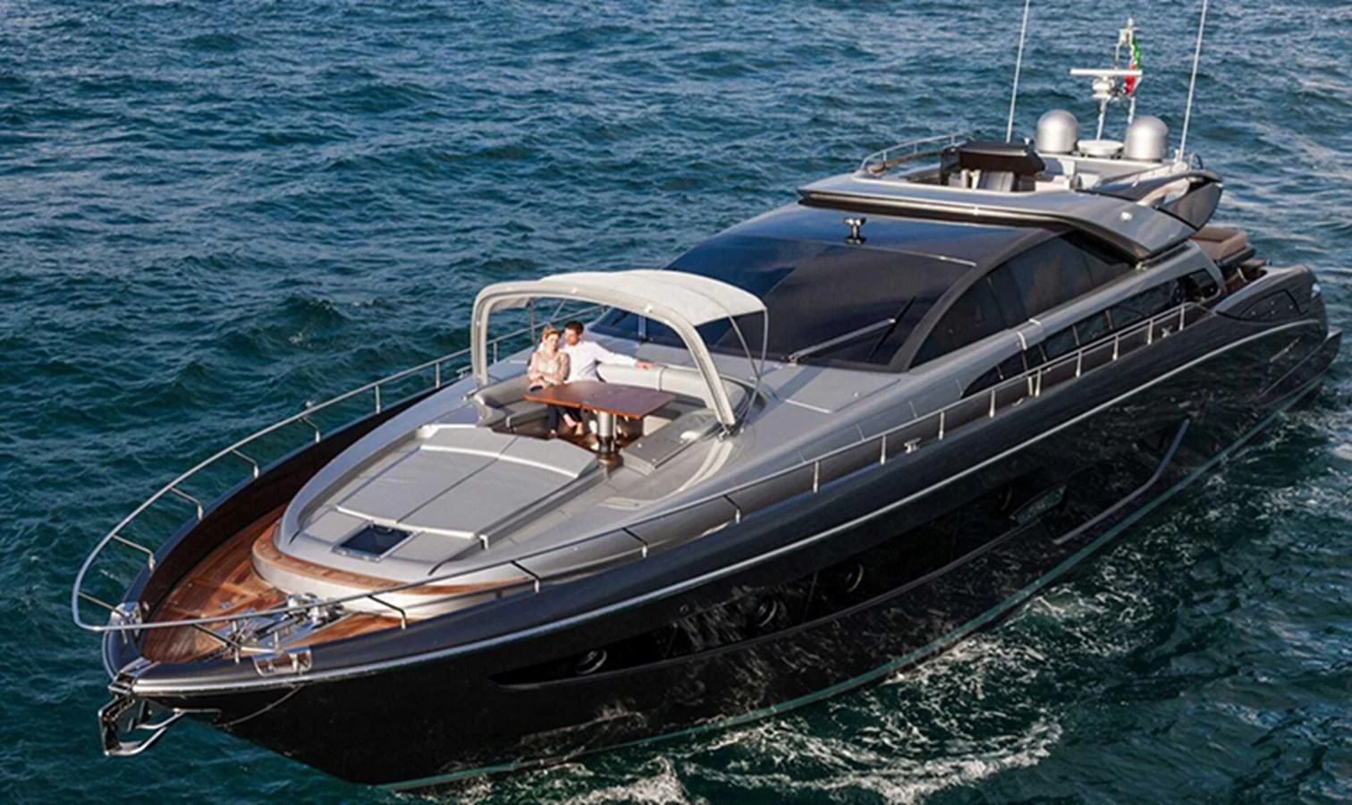 A sleek and modern yacht glides gracefully on the open water, showcasing its luxurious design and spacious deck. aboard ANTIOXIDANT Yacht for Sale