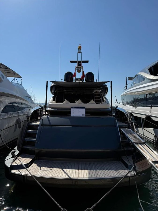 The yacht's stern is showcased, highlighting its sleek design and mooring setup. aboard ANTIOXIDANT Yacht for Sale