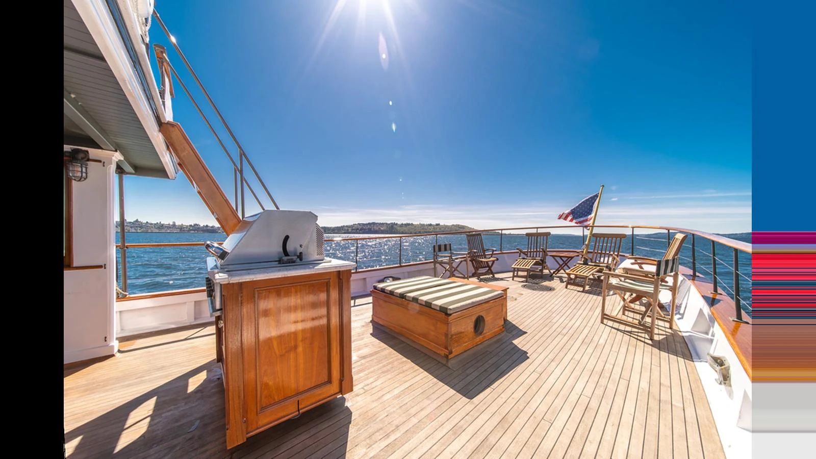 The aft deck offers a spacious and inviting area for relaxation and entertainment with stunning ocean views. aboard BLUE PETER Yacht for Sale