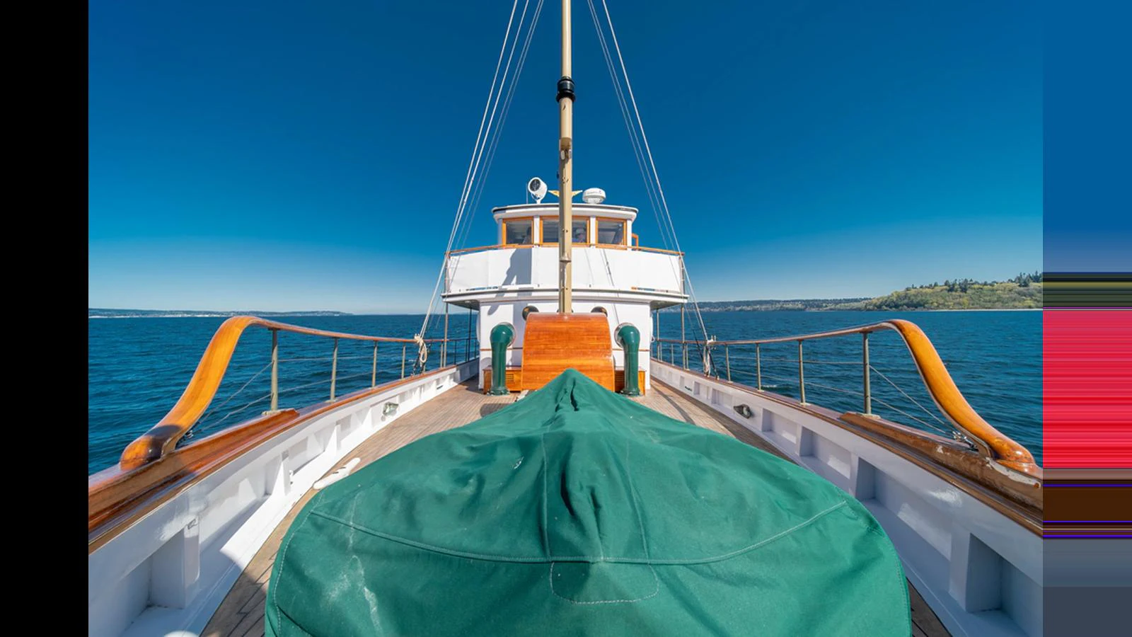 The foredeck of this yacht offers a spacious and inviting area with a beautiful view of the open sea. aboard BLUE PETER Yacht for Sale