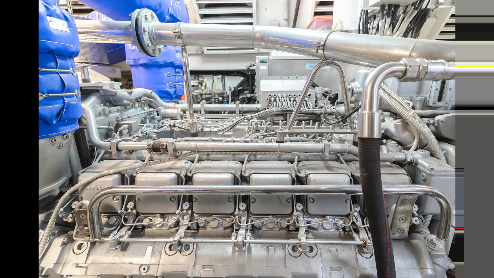 The image showcases the intricate details of the yacht's engine room, highlighting the advanced engineering and machinery. aboard SAIGON Yacht for Sale