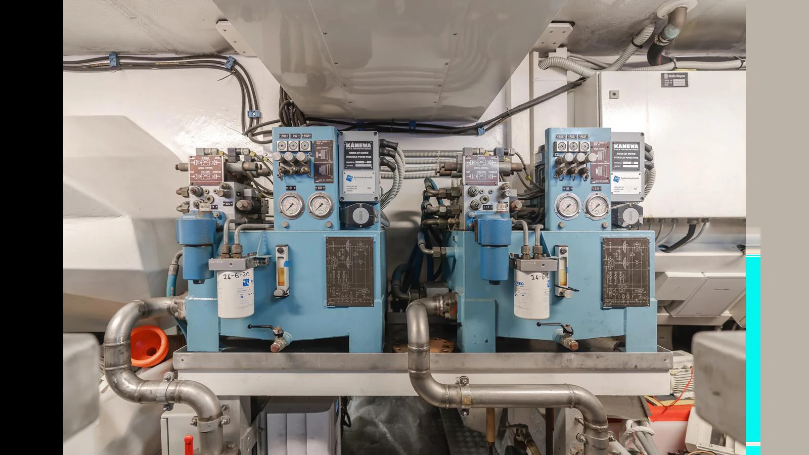 The image showcases the yacht's engine room with detailed machinery and equipment. aboard SAIGON Yacht for Sale