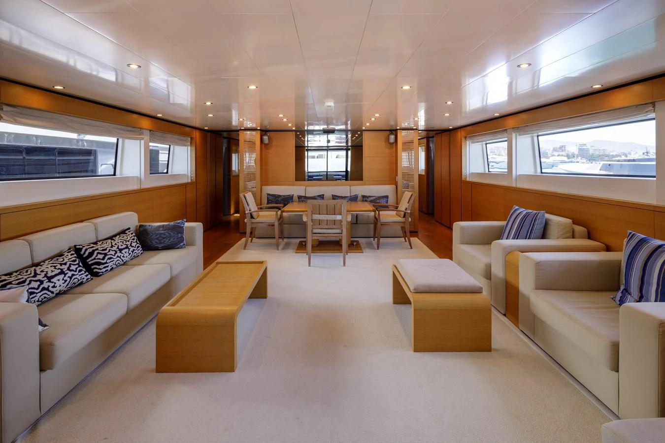 The spacious salon features modern furnishings and ample natural light. aboard BOLARO Yacht for Sale