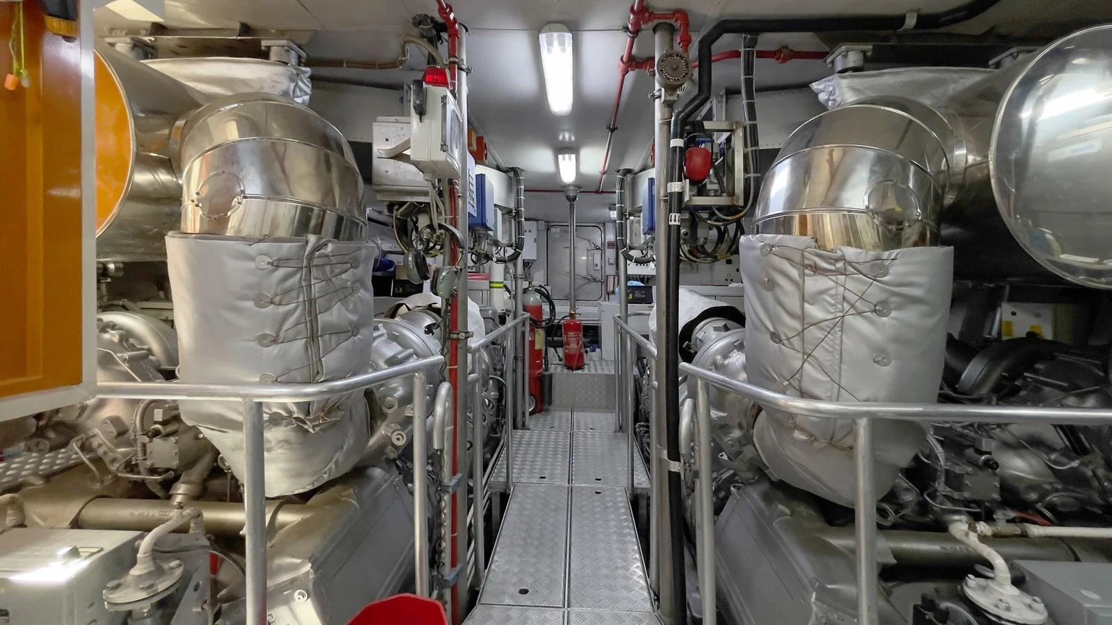 The image showcases the well-maintained engine room of the yacht, featuring advanced machinery and equipment. aboard BOLARO Yacht for Sale