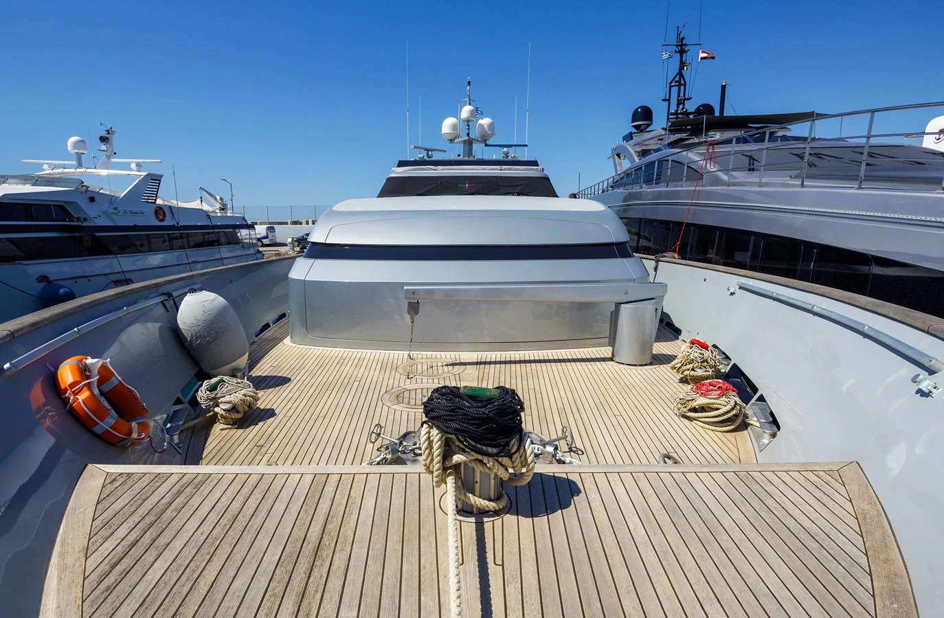 The foredeck of the yacht showcases a spacious and well-maintained area with a sleek design. aboard BOLARO Yacht for Sale