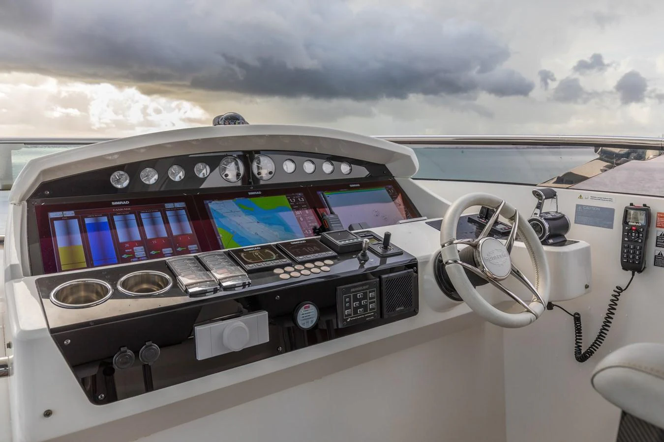 The helm station features advanced navigation and control systems, ensuring a smooth and safe voyage. aboard CLOUDIA Yacht for Sale