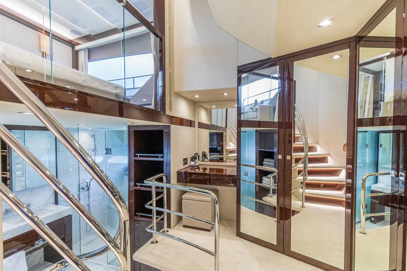 The yacht's interior features a modern, multi-level design with sleek finishes and ample natural light. aboard CLOUDIA Yacht for Sale