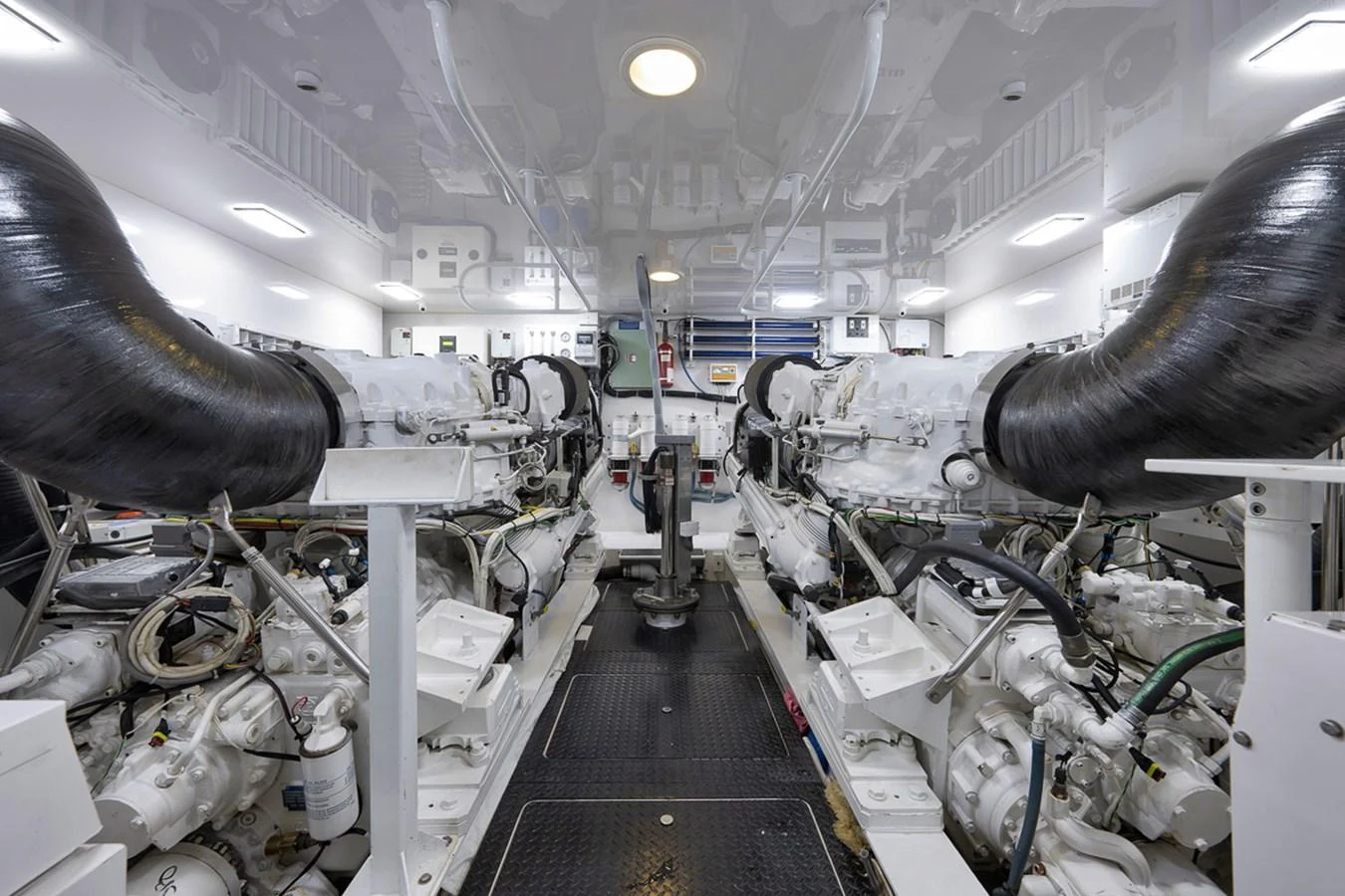 The engine room showcases the yacht's powerful and meticulously maintained machinery. aboard REEL HAWK Yacht for Sale