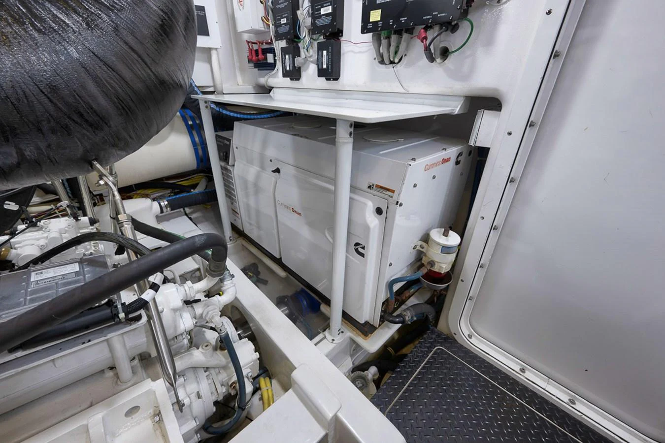 The image showcases the well-maintained engine room with advanced machinery and equipment. aboard REEL HAWK Yacht for Sale