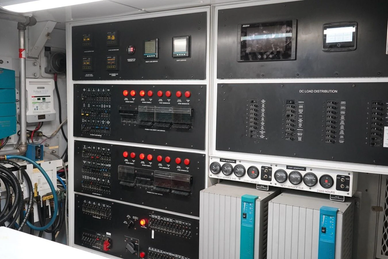 The yacht's engine room features a sophisticated control panel and electrical distribution system. aboard KNICKERBOCKER Yacht for Sale