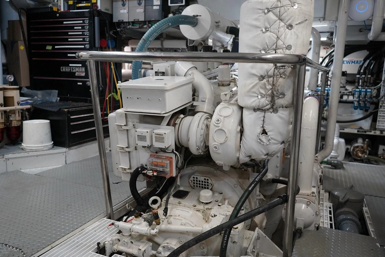 The image showcases the engine room with detailed machinery and equipment. aboard KNICKERBOCKER Yacht for Sale