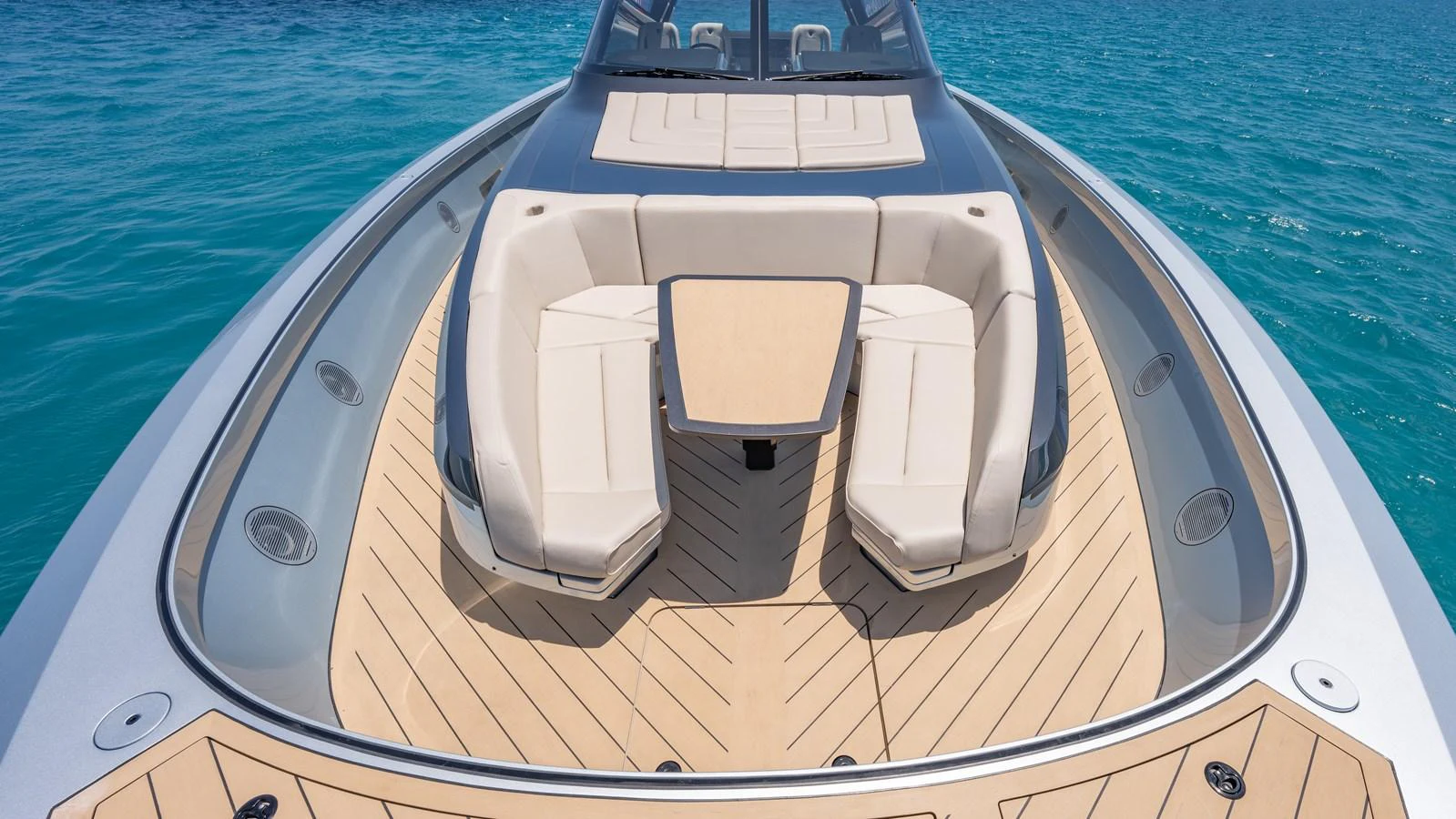 The yacht's bow features luxurious seating and a sleek design, perfect for enjoying the open sea. aboard RESOLUTE Yacht for Sale